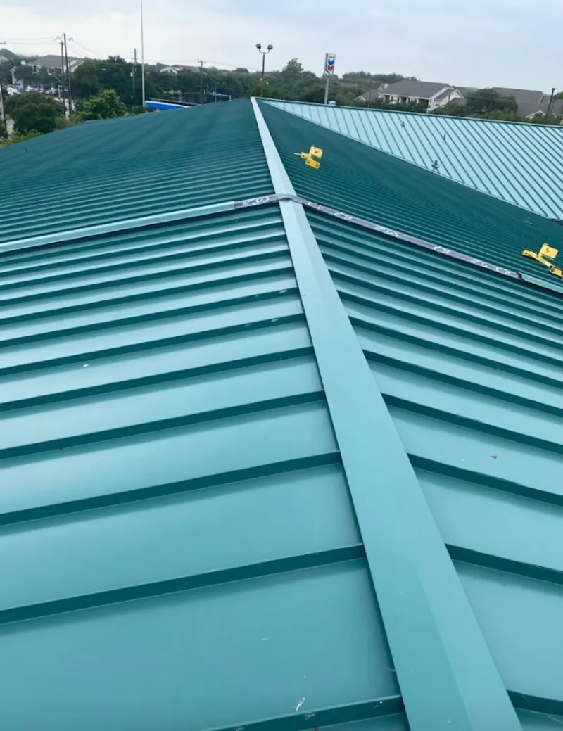 Green commercial metal roof ridge and valley for Metal Roof Repair in Plumas Lake